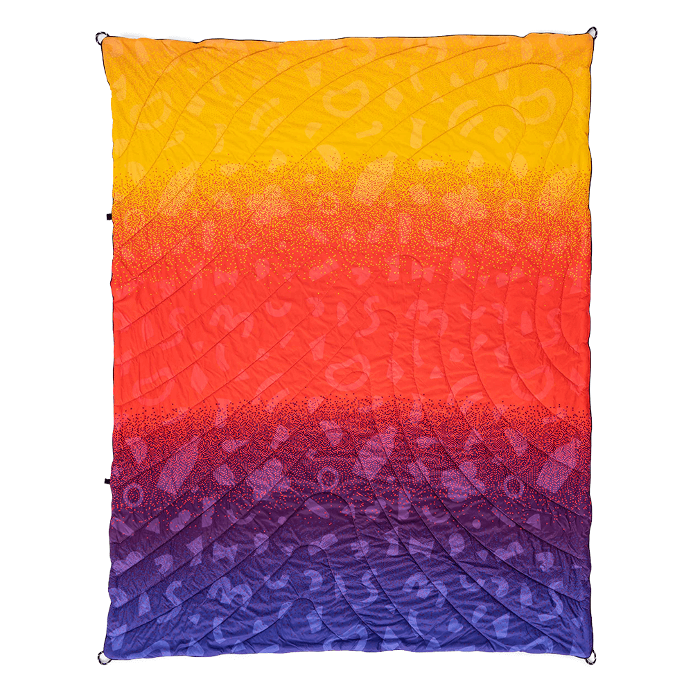 Front view of sunset gradient color DWR waterproof nylon puffy blanket, premium outdoor camping gear for bulk supply.
