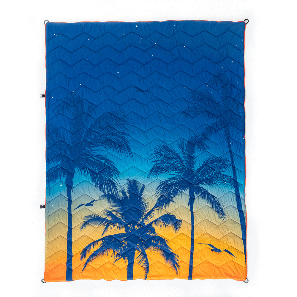 Custom printed tropical palm tree design nylon puffy outdoor blanket, weather-resistant travel theme bedding for wholesalers.