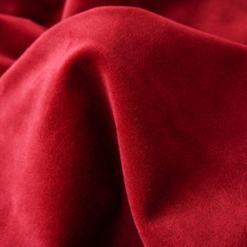Plush red minky fleece blanket detail, showing soft fluffy texture