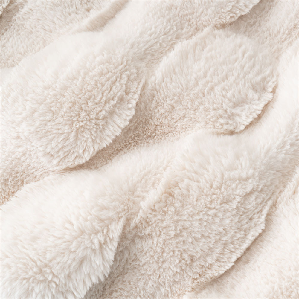 Macro close-up of the 3D ripple pattern and dense plush texture on a faux fur blanket from an OEM textile factory.