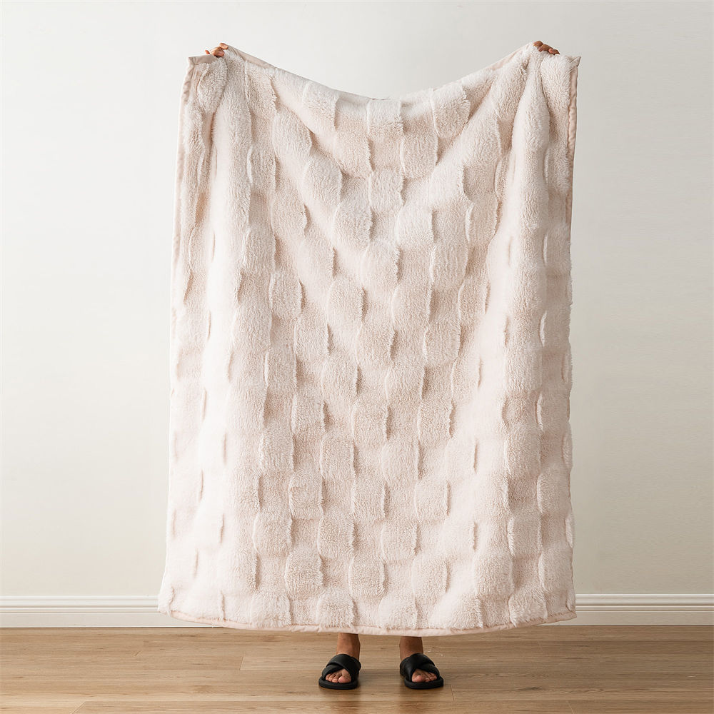 Wholesale double-sided ripple faux fur blanket in light pink, plush textured throw blanket from olive home manufacturer.
