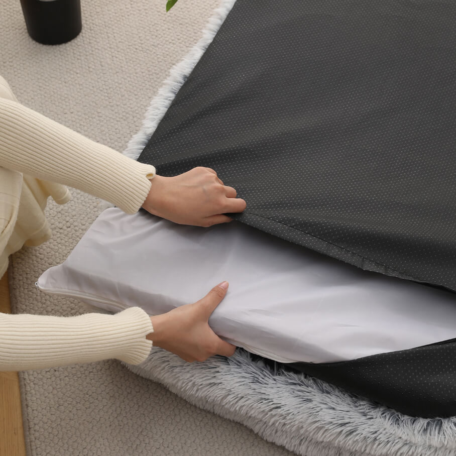 Demonstrating the removable and washable cover of plush dog sofa bed, easy maintenance design for wholesale pet supply stores