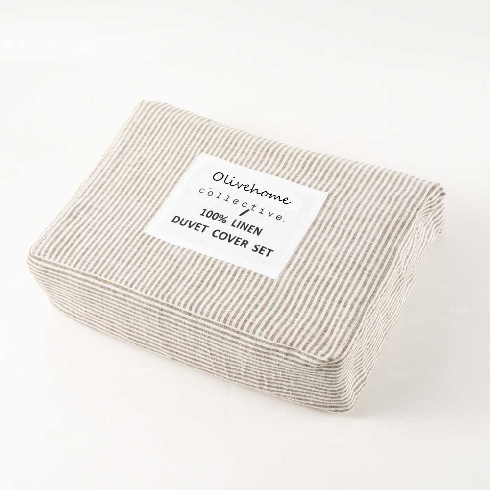 Packaged 100% French flax linen duvet cover set with Olivehome Collective label, luxury hotel and retail bedding for distributors.