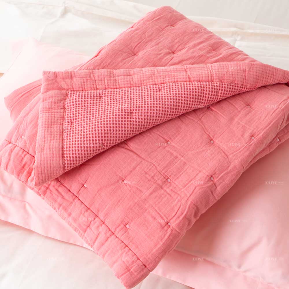 Mills waffle cotton quilt 6 Reversible Peachy Pink Mills waffle cotton quilt showing both soft milled cotton and honeycomb texture sides