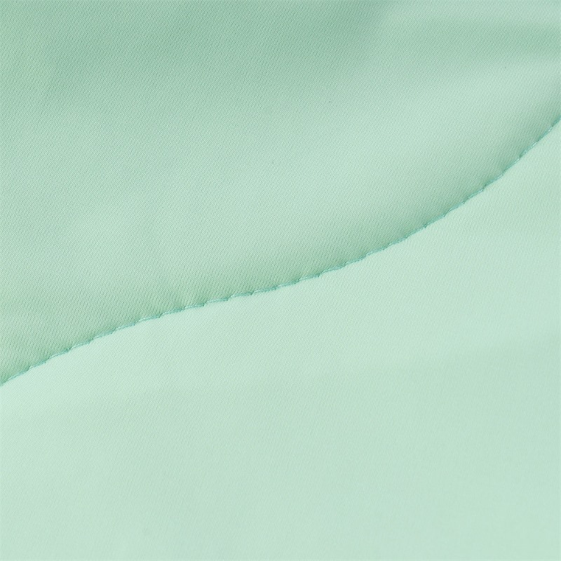 Close-up of premium stitching and high-density cool fabric on lightweight cooling comforter for bulk business inquiries