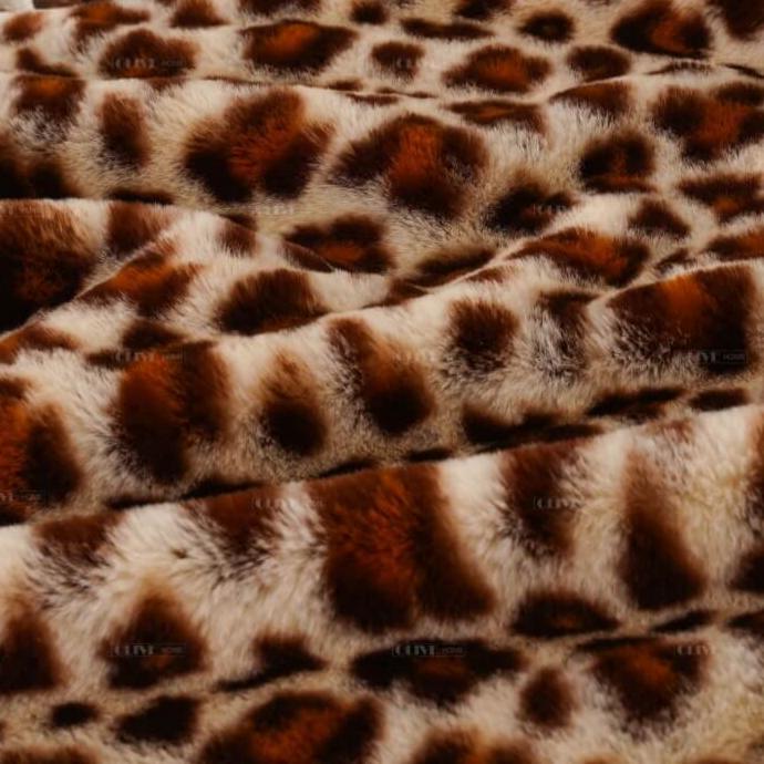 Leopard print faux fur blanket close-up fabric texture, zero shed plush luxury throw for B2B wholesale.
